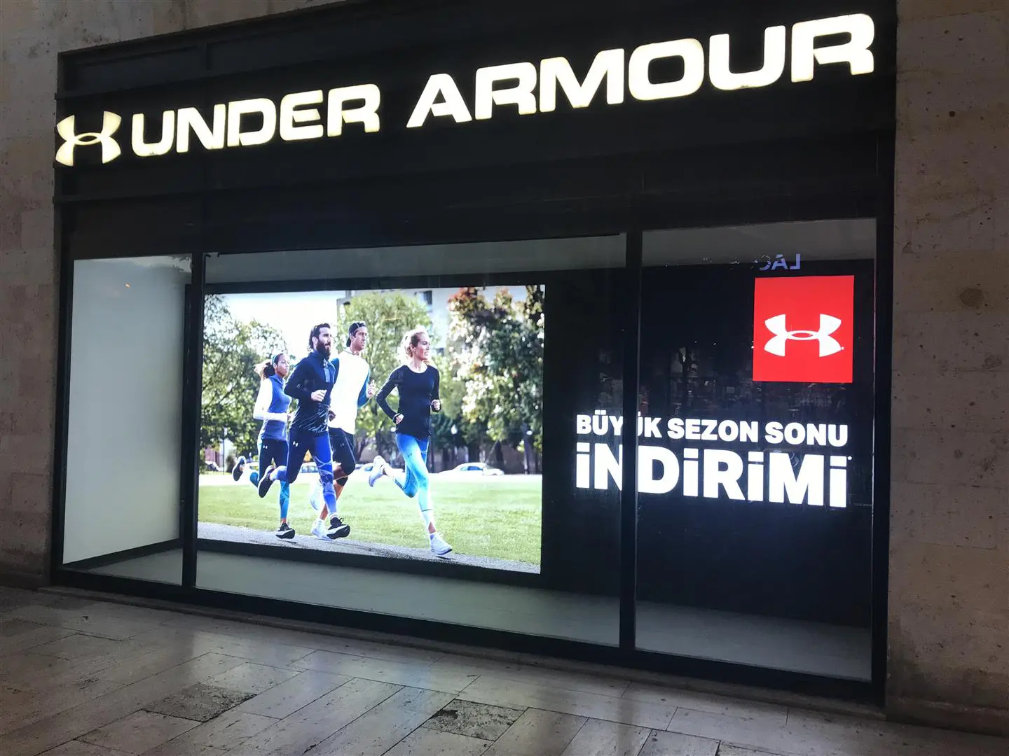 backlit-retail-graphics-under-armour Backlit retail graphics and illuminated display for an Under Armour storefront