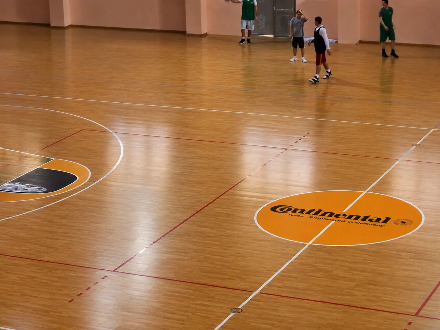 floor-graphics-continental Custom Continental floor graphics applied to an indoor sports court