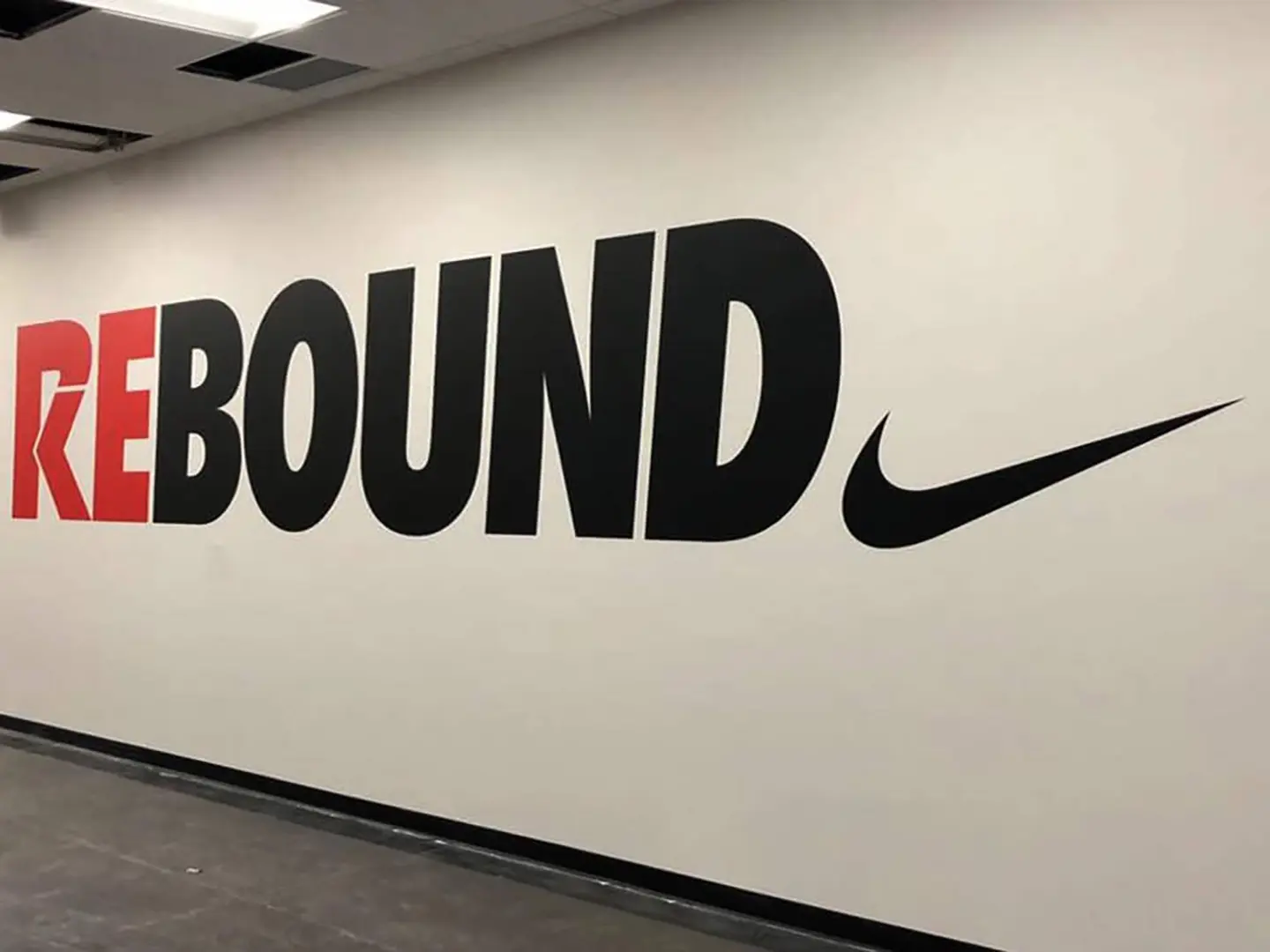 retail-wall-graphics-nike Large-format Nike wall graphics for a branded retail environment